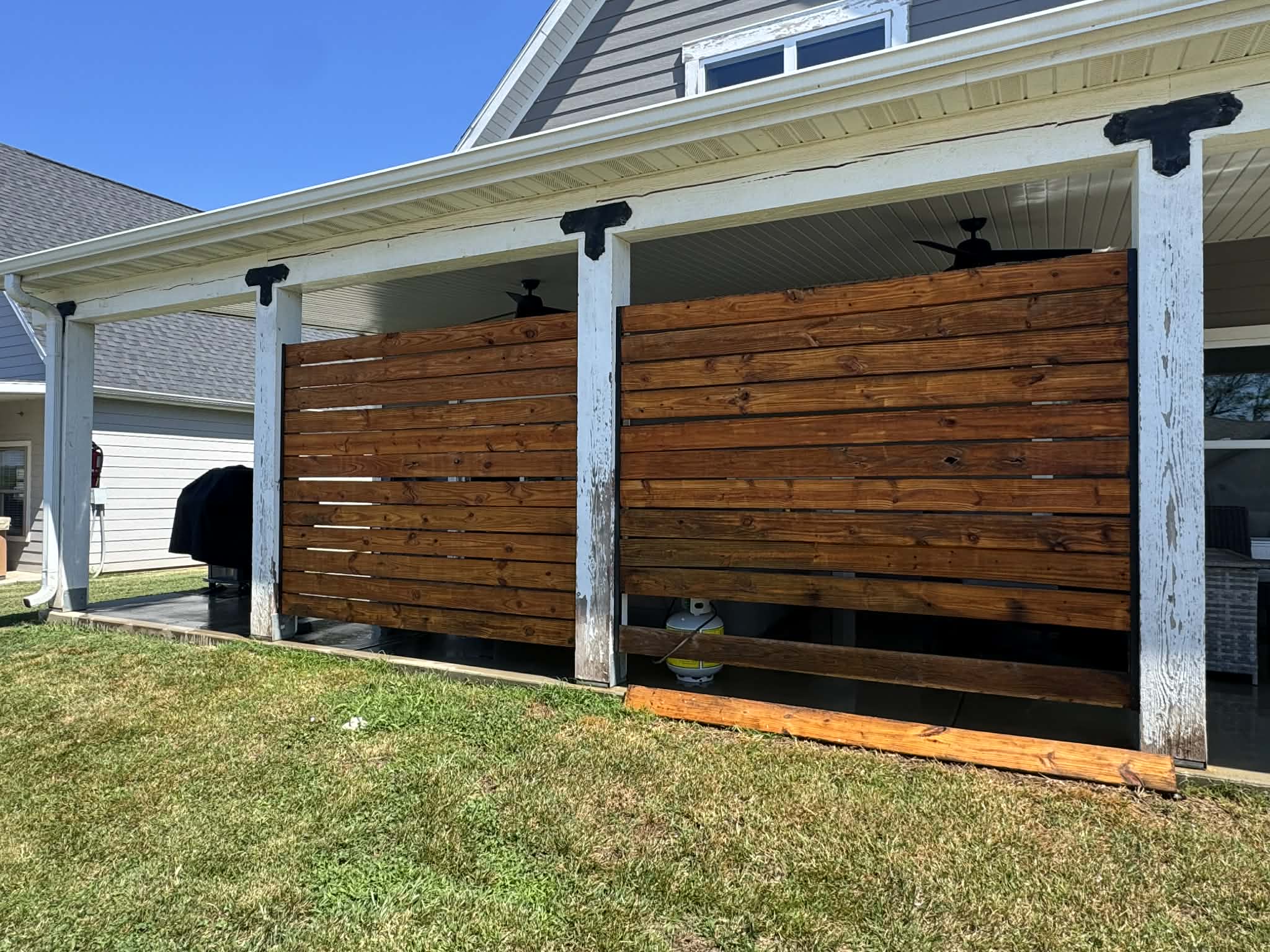 Wood privacy panels after cleaning — Branson MO